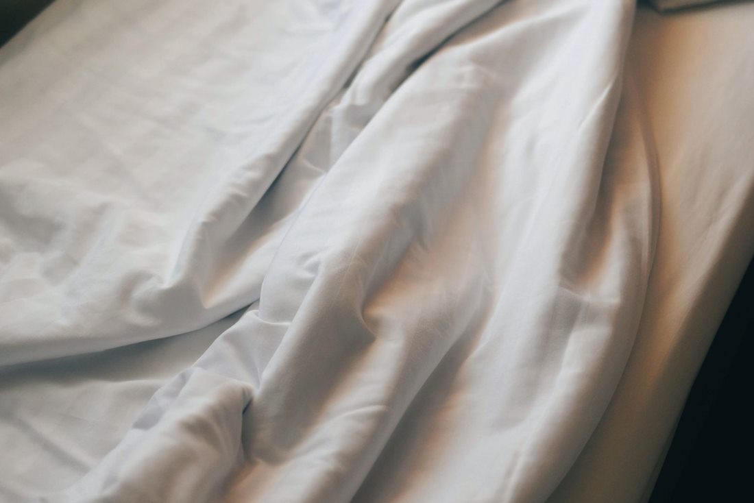 Cut-and-sewn cotton sheets folded and packed